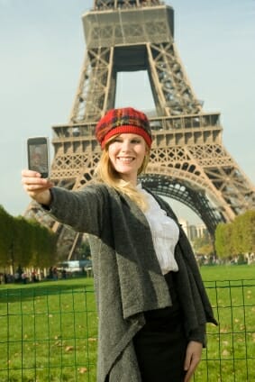 Solo Traveler in front of the Eiffel Tower